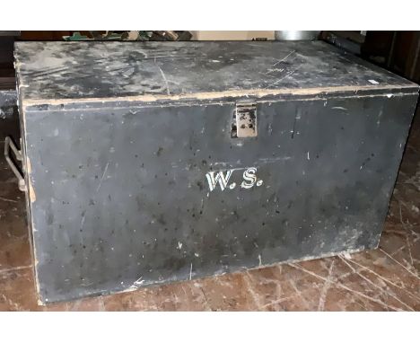 An early 20th Century oak ebony painted trunk, in a rectangular shape, mounted with iron handles, lifting hinged lid, initial