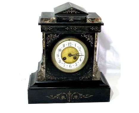 A late 19th Century ebonised marble and gilt strung mantel clock, 13cm dial with enamel chapter, twin wind up sockets with 8-