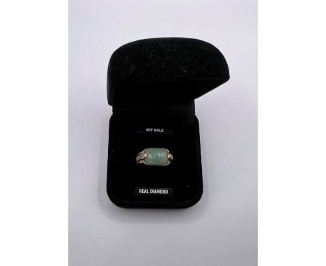 A 9ct gold , Jade and diamond art deco style ring. Hallmarked, size k. Jade not tested for treatment.