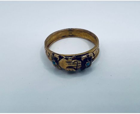 A rare 18th century betrothal ring, in the style of a fede ring, which opens into a gimmel or puzzle ring. Articulated in thr