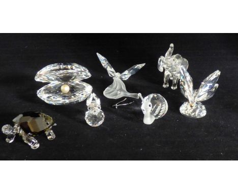 A collection of Swarovski&nbsp; crystal to include a pearl in an oyster , animals and insects , with original boxes and certi