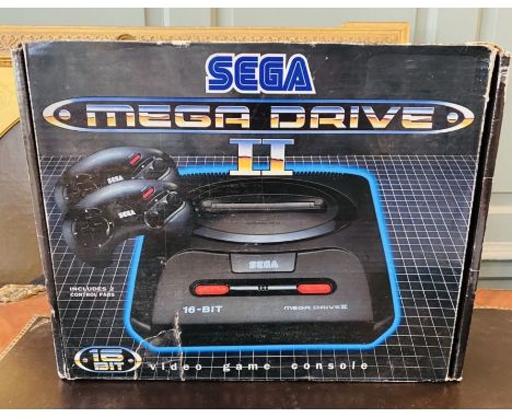 Sega mega drive II console with selection of games (qty)