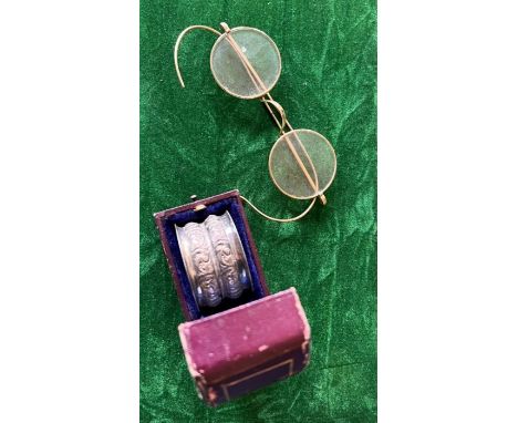 Pair gold framed spectacles (untested) Gross weight 11 grams. Boxed silver christening/napkin ring, engraved with the initial