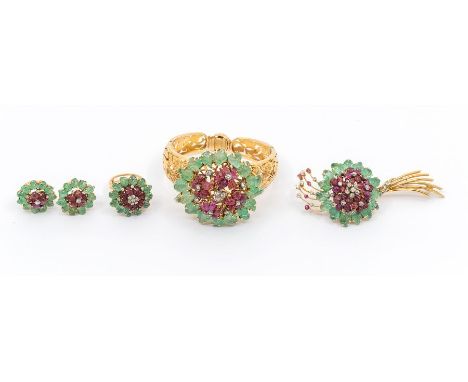 A mind 20th Century carved emerald, ruby and diamond gold suite, comprising a bangle, the centre set with a cluster of round 