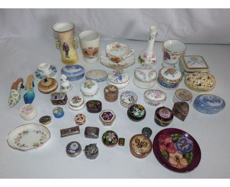A large collection of ceramic boxes pill and trinket boxes , Royal Doulton vase , Royal commemorativesand a Moorcroft pin dis