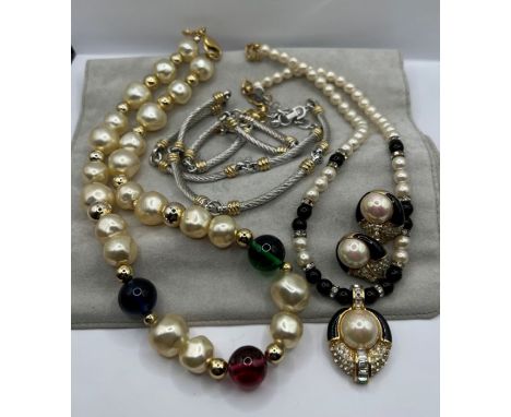 A selection of Christian Dior cotume jewellery comprising a faux pearl and coloured bead collar; a pearl and black bead neckl