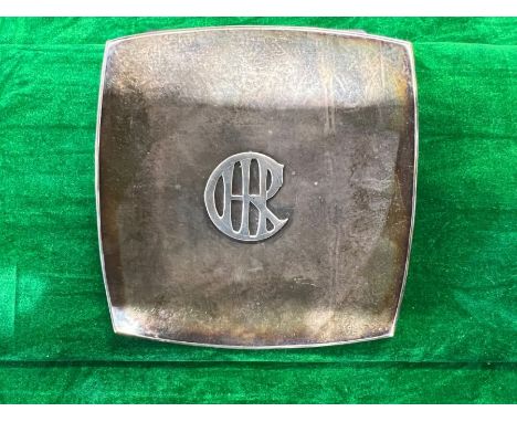 Square shaped handmade (hammer formed) ring dish, approx 11.5cm x 11.4cm, sitting on a lipped foot, with removable initial pa