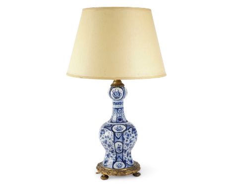 A DUTCH DELFT POTTERY BLUE AND WHITE VASE TABLE LAMP 18TH CENTURY AND LATERdecorated with panels of tulips, flowers and diape