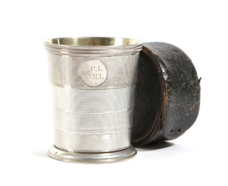 A VICTORIAN SILVER COLLAPSIBLE BEAKERBY THOMAS JOHNSON, LONDON 1863, RETAILED BY BRIGGS of tapering circular form, with engin