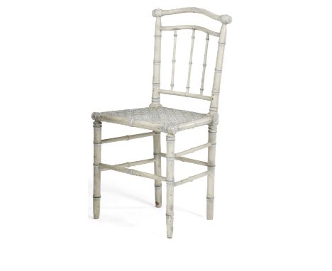 A PAINTED FAUX BAMBOO SIDE CHAIRIN REGENCY STYLE, POSSIBLY BY COLEFAX & FOWLERwith a cane seatProvenanceParker & Morris: The 