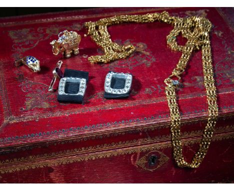 A MIXED GROUP OF COSTUME JEWELLERYcomprising: a pair of paste buckles in white metal settings, a fancy-link long chain, a gol
