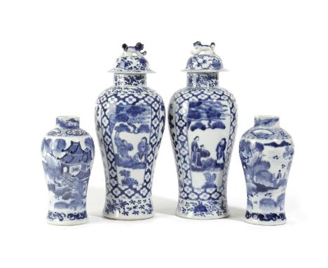 A PAIR OF CHINESE PORCELAIN BLUE AND WHITE VASES AND COVERSEARLY 20TH CENTURYof inverted baluster form, painted with figural 