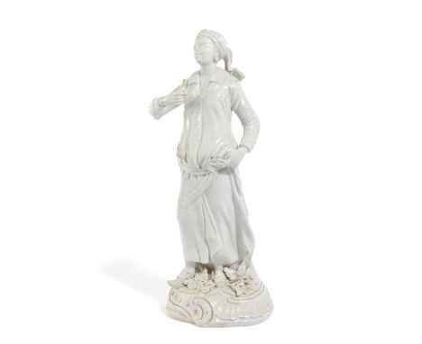 A WHITE-GLAZED DERBY PORCELAIN FIGURE OF THE ABYSSINIAN ARCHERC.1765wearing a flowing robe with a sword tucked in her sash, t