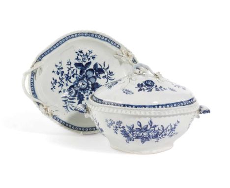 A LARGE WORCESTER PORCELAIN BLUE AND WHITE TUREEN WITH COVER AND STANDC.1775of quatrefoil form printed with the Pine Cone Gro