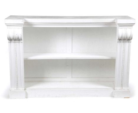 A WHITE PAINTED OPEN BOOKCASEIN 18TH CENTURY STYLE, 20TH CENTURYof inverted breakfront form, with a single shelf flanked by a