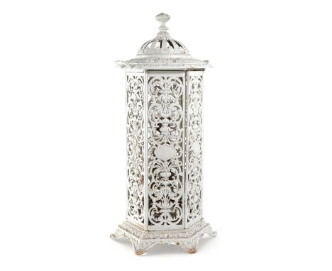 A FRENCH CAST IRON AND ENAMEL GARDEN STOVELATE 19TH / EARLY 20TH CENTURYof hexagonal form with pierced grotesque decoration i