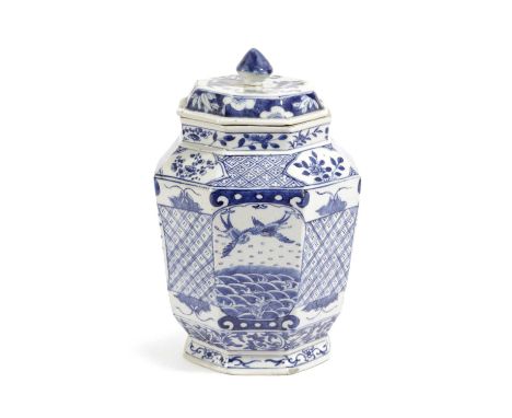 A CHINESE PORCELAIN BLUE AND WHITE OCTAGONAL VASE AND COVERLATE 19TH CENTURYpainted with alternating panels of birds above wa