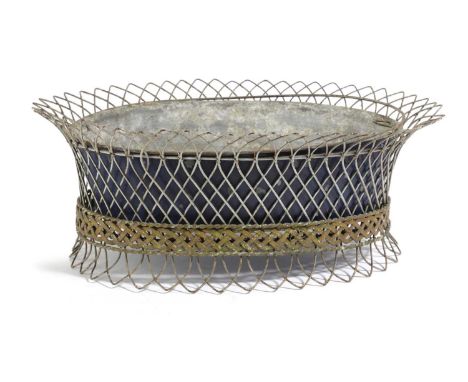 A WIREWORK PLANTER19TH CENTURYof oval form, with a tôle liner16cm high, 41cm wide, 30.5cm wideProvenanceParker & Morris: The 