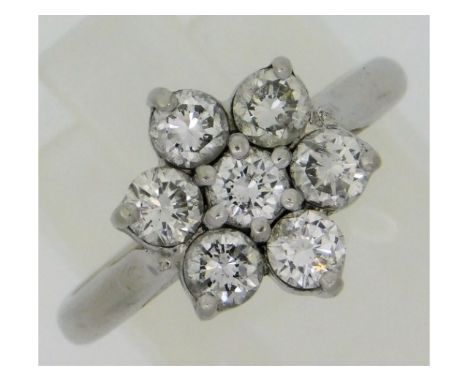 A platinum daisy ring set with 1.06ct of diamonds, size K, 5.2g