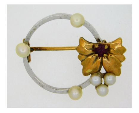 A yellow &amp; white metal brooch set with pearl &amp; ruby, tests electronically as 10ct gold, 26mm wide, 3.1g