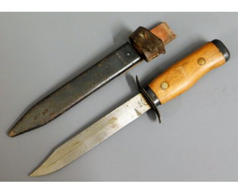 A military dagger &amp; scabbard, blade stamped R07650, a circled 11, 1956, 11.25in long