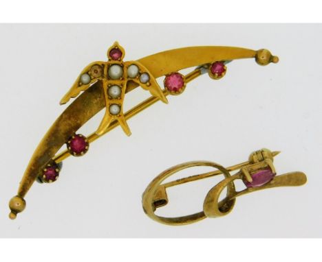A 9ct gold garnet &amp; pearl brooch with swallow decor, 45mm wide, one pearl missing twinned with one other gold brooch set 