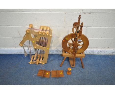 A BEECH SPINNING WHEEL, a loom, and a pair of wool stretchers (condition report: general signs of usage) (4)