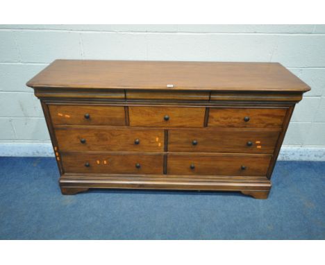 A WILLIS AND GAMBIER ANTOINETTE CHEST OF TEN DRAWERS, the three secret drawers and two of the top drawers with blue inserts, 