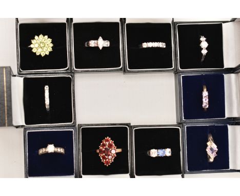 A SELECTION OF TEN WHITE METAL GEM SET RINGS, various designs, set with assorted cubic zirconia or semi-precious gemstones, m
