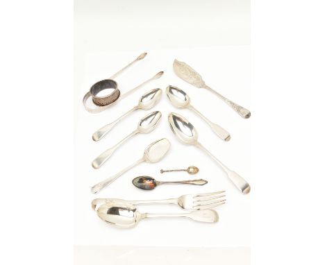 AN ASSORTMENT OF SILVER FLATWARE, to include a silver napkin ring, a pair of sugar tongs, a pair of fiddle pattern spoons, fi