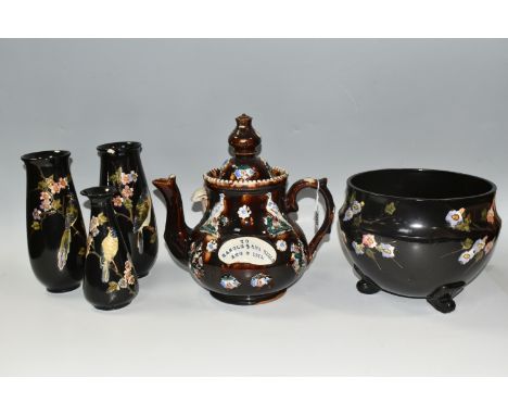A LARGE MEASHAM POTTERY BARGEWARE TEAPOT, decorated in traditional  design having typical moulded floral motifs on a brown mo