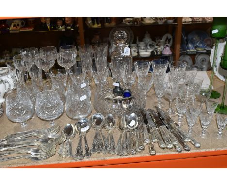 A QUANTITY OF MOSTLY CRYSTAL CUT GLASSWARE three green Wedgwood Brancaster descending candlesticks with three green candles, 