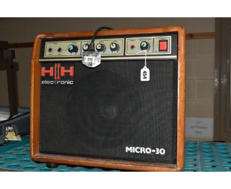 AN HH MICRO-30 AMPLIFIER, fitted with an HH model 10G fifty watt loudspeaker (Condition Report: untested, some knocks and wea