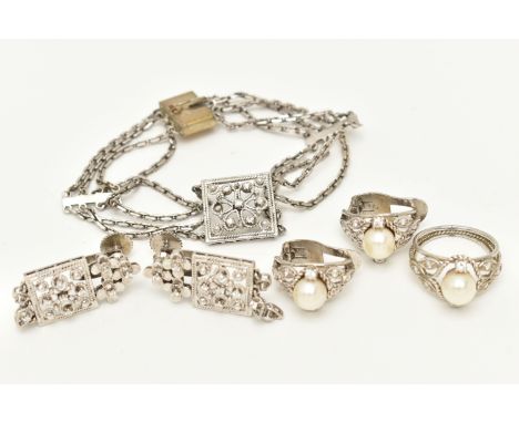 A PAIR OF WHITE METAL CULTURED PEARL AND DIAMOND EARRINGS AND MATCHING RING WITH ANOTHER PAIR OF EARRINGS AND A BRACELET, set