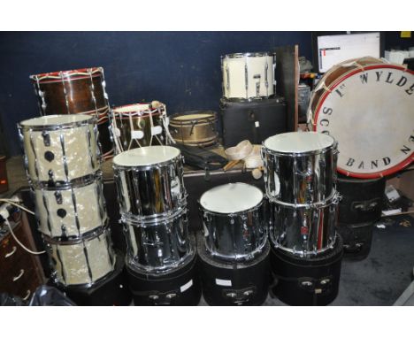 FOURTEEN MARCHING BAND DRUMS including a 25x11in bass drum, two 18x9in (all three in natural finish) three Premier chrome 14x