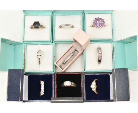 A SELECTION OF TEN WHITE METAL GEM SET RINGS, various designs, set with assorted cubic zirconia or semi-precious gemstones, m