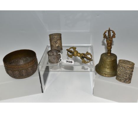 A GROUP OF ASIAN METAL WARE, possibly Tibetan and Indian in origin, comprising a napkin ring decorated with deities in relief
