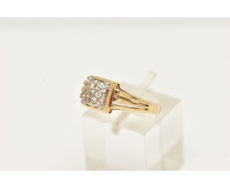 A DIAMOND DRESS RING, the domed square shape diamond set panel set with seven single cut diamonds, grain set, to the split sh