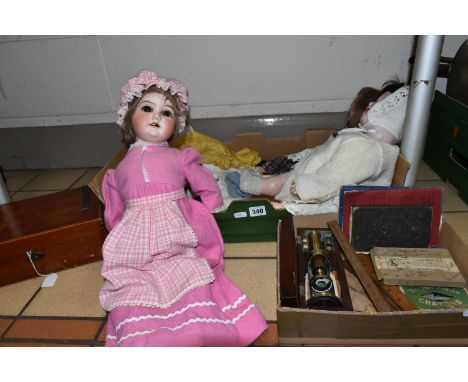 TWO BOXES AND LOOSE DOLLS, MICROSCOPE, WRITING SLOPE AND SUNDRY ITEMS, to include a Heubach Koppelsdorf 317.6 bisque head bab