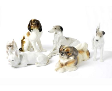 Six porcelain models of dogs, including a Goldscheider King Charles Spaniel, 20 cm long; two by Metzler and Ortloff, includin