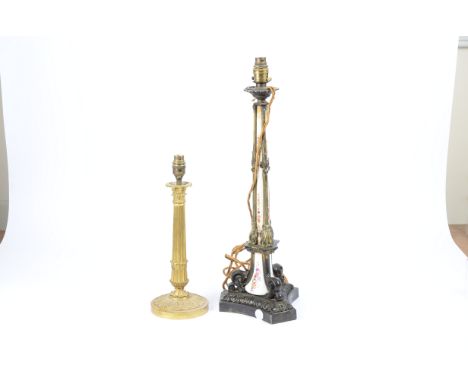 A late 19th Century lamp base, fluted brass stem with scrolling detail and ceramic inserts decorated with flowers, 60 cm high