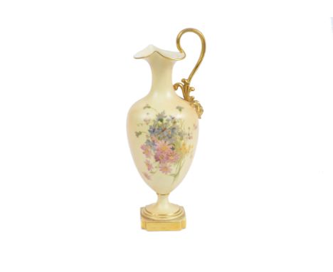 A Royal Worcester porcelain pedestal ewer, floral decoration on blush ivory ground, gilt highlights, shape 1944, 1908, puce m