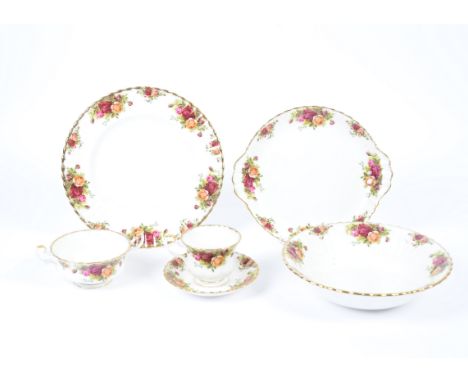 A Royal Albert 'Old Country Roses' part dinner service, consisting of eight dinner plates, two small tea plates, six medium t