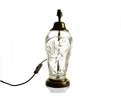 A 20th Century cut glass and brass table lamp base, 42 cm high including fitting