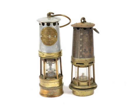 A Hailwood and Ackroyd Ltd. miners safety lamp, 27 cm high, together with a similar example, 26 cm high (2) 