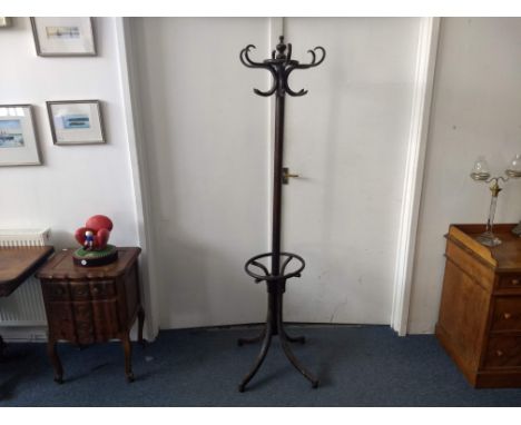 A 19th Century bentwood hall stand, six branches and finial, quadraform base, 184 cm high