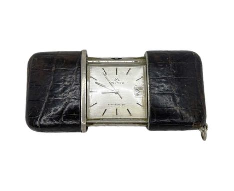 An Art Deco Movado Ermetoscope Pocket Watch Circa 1950The brown leather retractable cover opening to reveal the square shaped