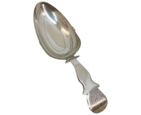 Georgian Silver Caddy Spoon. 17 g. London 1813, Thomas James. Light decoration to bowl. Monogram to terminal.Length 11.3 cmsC