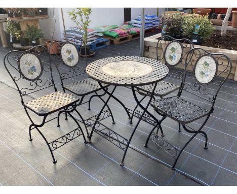 Metal Lattice Work with Inset Tile Decoration Table and 4 Matching ChairsDiameter 70 cmsCondition report: Minor weather relat