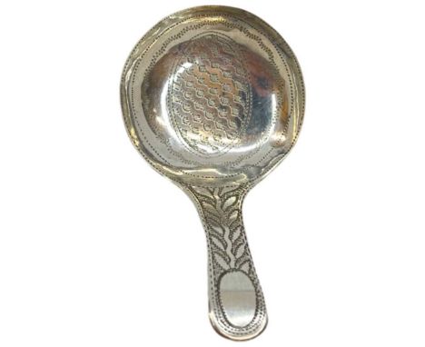 Georgian Silver Caddy Spoon. 4 g. Birmingham 1813, John Lawrence. Prick engraved decoration to bowl and stemLength 5.4 cmsCon